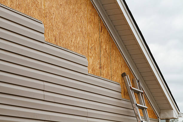 Professional Storm Damage Siding Repair technician working in Gwynedd Valley, PA